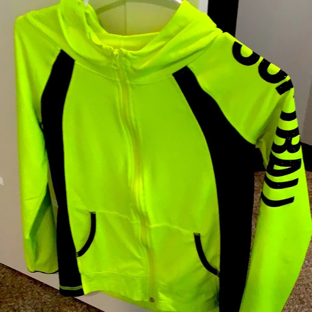 A neon color softball jacket
